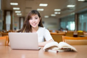 41584824_s - asian female studying